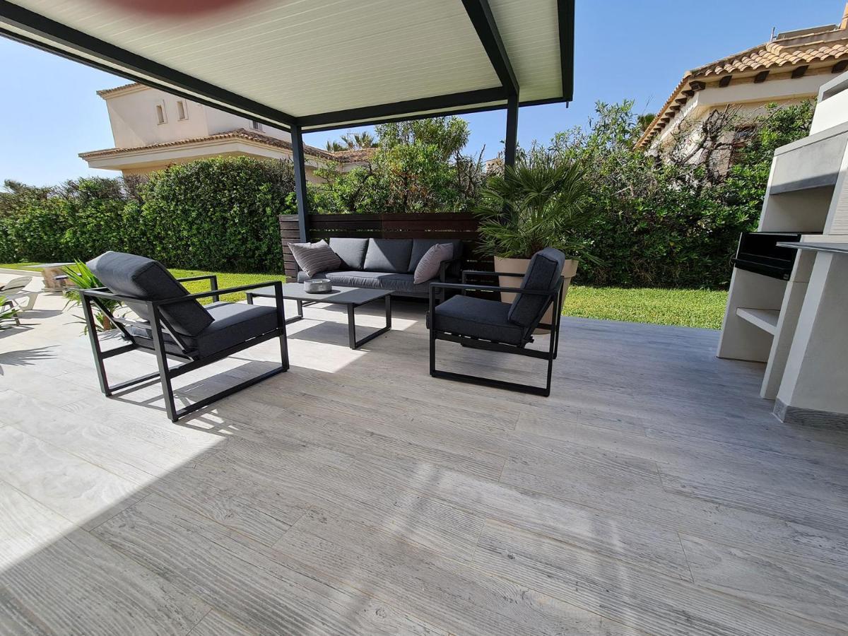 Villa On The Beach Playa Flamenca โอริอุเอลา ภายนอก รูปภาพ